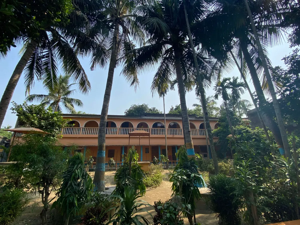 Comfortable guest room at Narahari Dham